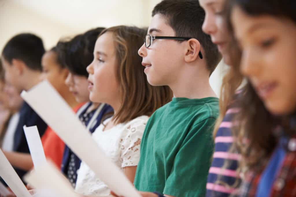 children singing in church choir